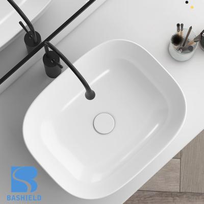 China China Manufacturer Contemporary White Ceramic Bathroom Sink Hotel Wash Basin for sale