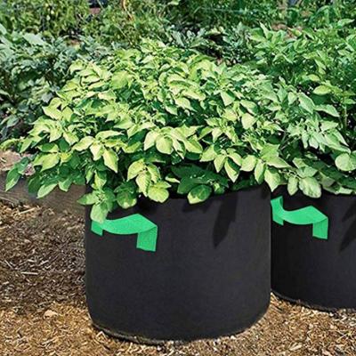 China Eco-Friendly 30 Gallon Grow Bags Black Fabric Planting Pots Grow Pockets Fabric Handles Vegetables Container for sale