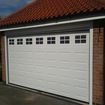 China Modern Sectional Garage Door Finger-Protection Steel Door for sale