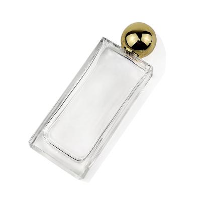 China Factory hot sale cosmetic ready to ship 100ml luxury empty perfume bottle glass with zinc alloy gold meal cap for sale