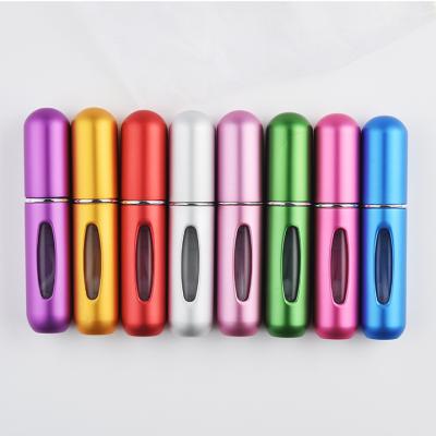 China Women's Size 5ml Mini Gold Silver Red Blue Black Red Purple Green Cosmetic Refillable At The Bottom 5ml Perfume Travel Atomizer Bottle for sale