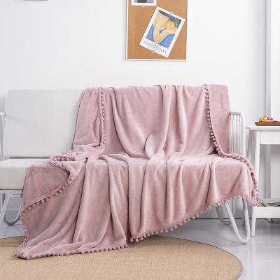 China Wholesale Cheap Warmable Solid Color Flannel Blanket With Tassel Winter Blanket With Ball for sale