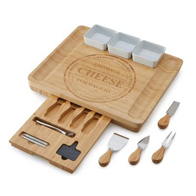 China Sustainable New Arrival Hot Selling Cheese Board Set With Tool And Bamboo Cheese Tray Slide Drawer And Ceramic Dip Bowls for sale