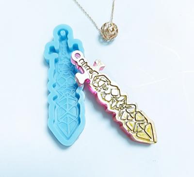 China Viable Handmade Crystal Epoxy Necklace Pendant Silicone Mold DIY Jewelry Sword Mold for sale