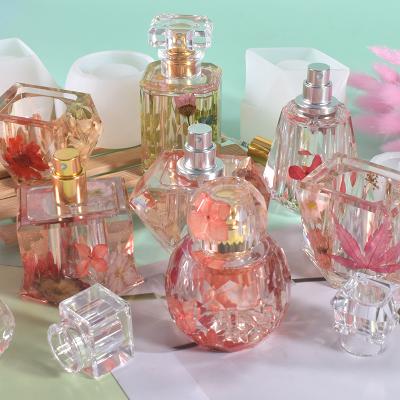 China DIY Crystal Epoxy Resin Storage Mold Viable Irregular Perfume Bottle Silicone Mold for sale