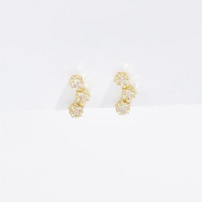 China Cute 18K Gold Plated Elegant Sparkling Crystal Cubic Zircon Flower Star Stud Earrings for sale