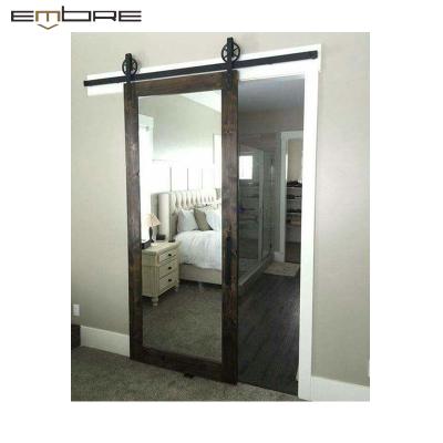 China Chinese Interior Frameless Sliding Door Top Hung Noiseless Mirror Glass Barn Door for sale