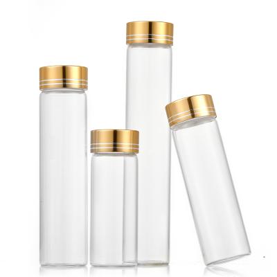 China Personal Care Manufacturer Custom Mini Round Spray Bottles 40ml 50ml Spices Glass Cosmetic Glass Bottle for sale