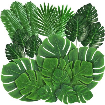 China Beautiful Factory Wholesale Green Tropical Monstera Leaves Artificial Palm Leaves For Decoration for sale