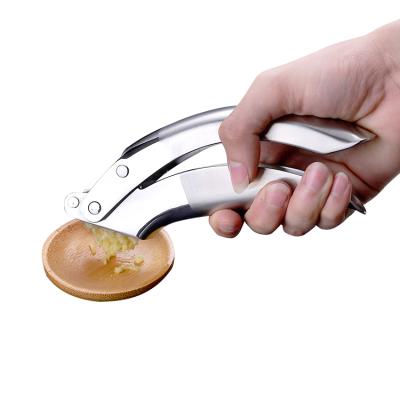 China Viable Top Selling Elegant Mirror Polished Garlic Crusher Ginger Meat Vegetable Chopper Press for sale