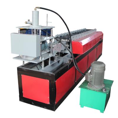 China High Speed ​​Customized Fly Saw Cut Shutter Slat Slat Door Roll Forming Making Machine for sale