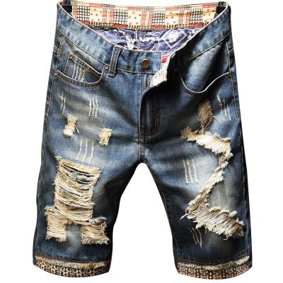 China Breathable Running Men's Short Jeans Scratch Damage Hole Designer Blue Stretch Jeans Ripped Jeans Wholesale for sale