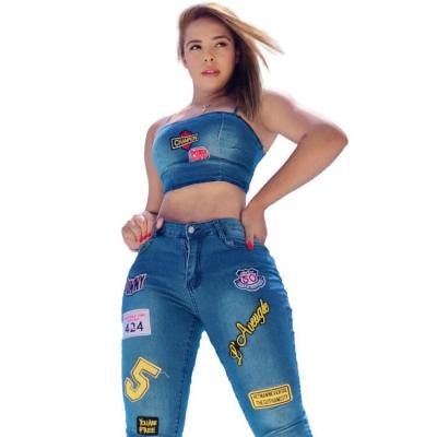 China Breathable Shoulder Straight Strap Tops With Jeans Pants Fashion Latest Design Sequin Cartoon Style Two Piece Sets Jeans For Women for sale