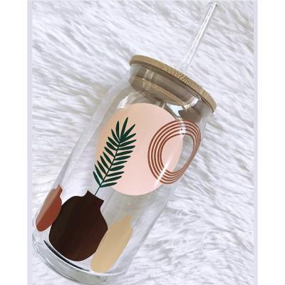 China Beer can shaped glass 12oz 16oz 18oz Glass Can with Bamboo Lid and Straw Clear Frosted Sublimation Optional Beer Can Shaped Glass for sale