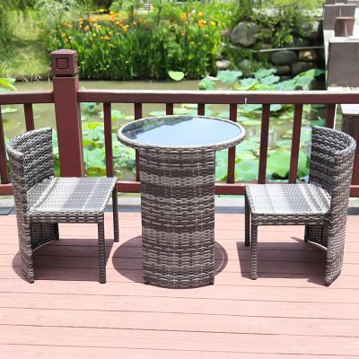 China Eco-friendly new design outdoor patio furniture leisure three sets table and chair make with outdoor rattan dinner chair for sale