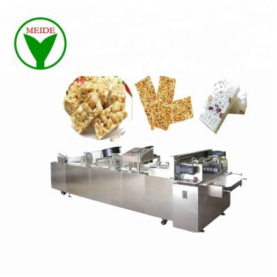 China Cereal Grain Nut Rice Candy Snack Bar CANDY Puffed Lapping Cutting Machine for sale