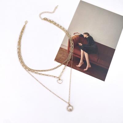 China NEWEST Multi Layer Heart Necklace Overlapping Link Chain Rhinestone Gold Plated Pendant Necklace for sale