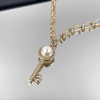 China FASHIONABLE Hot Selling Retro Exquisite Rhinestone Pearl Key Clavicle Pendent Necklaces Hot Selling Necklace For Women for sale