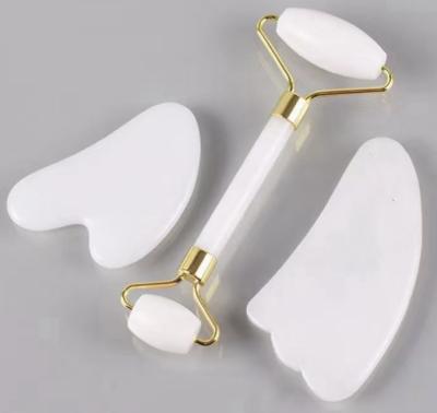 China Trigger Blood and Dredge Safeguards Jade Roller and Gua Sha Face Roller Skin Care Machines Quartz Massager for Face Eyes Neck Body for sale