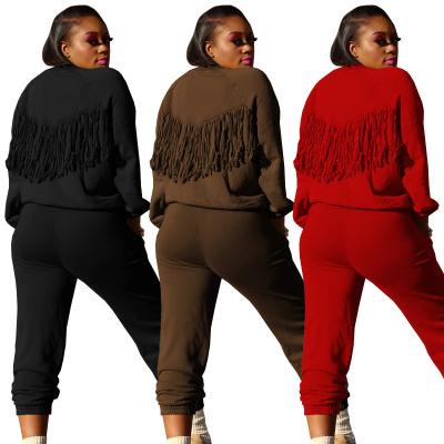 China TG033 QUICK DRY 2 Piece Gaiters Tassel Jogger Set Winter Fashionable Women Clothing Women Two Piece Set for sale