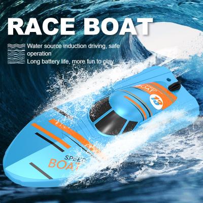 China RC Hobby 2.4G Simulation Water Jet Long Life Speedboat Model Waterproof Charging Remote Control Boat Kits Remote Control Boat Toy for sale