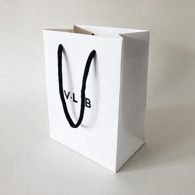 China Recyclable Fancy Papers White Paper Bag With Cotton Rope Custom Printed Logo Luxury Gift Paper Shopping Bag for sale