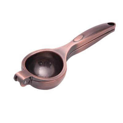 China Vintage Metal Lemon Squeezer Lime Squeezer Durable Heavy Duty Zinc Alloy Orange Manual Squeezer Red Bronze Color for sale