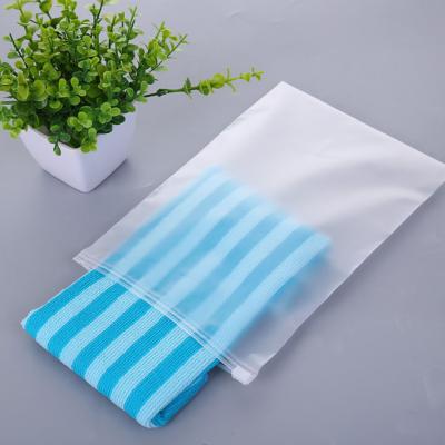 China BIODEGRADABLE Custom Logo Plastic Frosted Slider Zip Zipper Bag Apparel Packaging Bags With Zipper Lock for sale