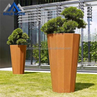 China Backyard American Round Outdoor Rust Style Flower Pots Modular System Metal Plant Steel Pots for sale