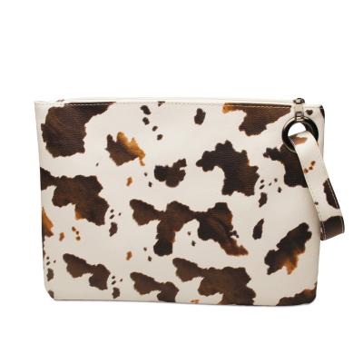 China NATIONAL VINTAGE COWHIDE PU Leather Envelope Clutch Bag Zipper Bangles Makeup Bag For Women DMA71870 for sale