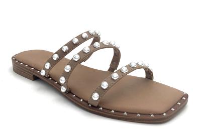 China Cómodas y elegantes sandalias planas para mujeres con parte superior de cuero en venta