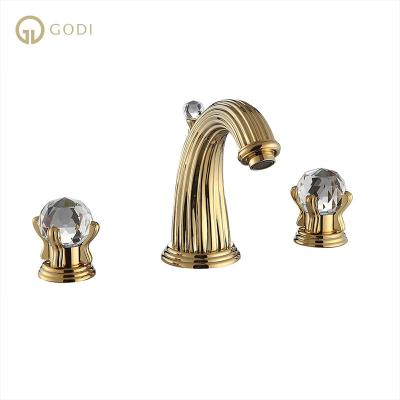 China Crystal Gold Basin Faucet Dual Mixer Taps GODI Faucets Handle Metered Water Faucet for sale