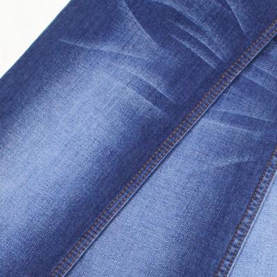 China Wholesale Stock Lot Woven Blue Stretch Denim Fabric Shrink-Resistant For Jacket for sale