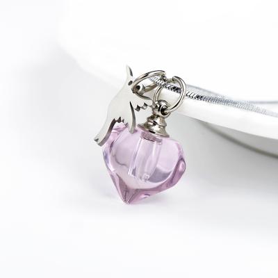 China Personalized Different Colors Heart Shape Hummingbird Decoration Vial Cremation Necklace From Ash Urn Factory Direct Sell for sale