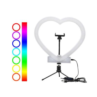 China Adjustable Shine Foldable Phone Tripod Stick 10 Inch 3 In 1 Smart Heart-Shaped Selfie Phone Ring Light Desktop Camera Tripod for sale