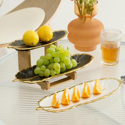 China Sustainable The most creative double-layer ceramic fruit plate bamboo stand cake plate sushi plate in 2023 for sale