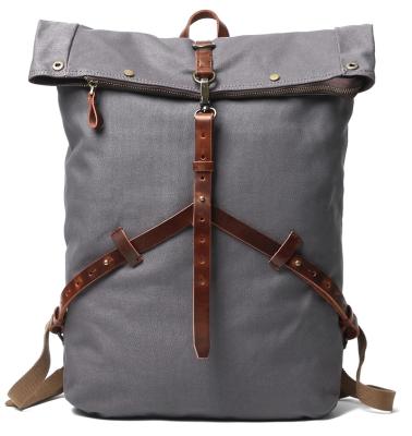 China Waterproof Outdoor Traveling Camping Hiking Bag Vintage Canvas Rucksack Leather Backpack Men for sale