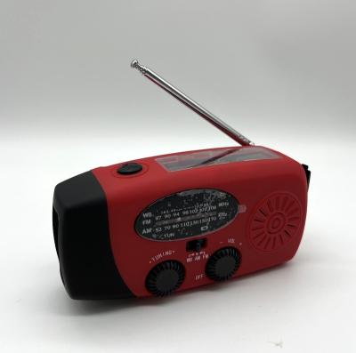 China PORTABLE Emergency Hand Crank Portable Solar Radio with Flashlight & 2000mAh Phone Charging for sale