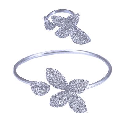 China CLASSIC Customize Fashion Leaf Design Charm Jewelry Set Pave Full Zircon Arc-knot Luxury Bracelets Ring Sets for sale