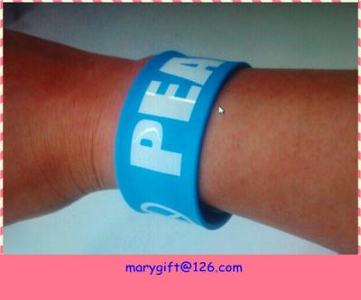 China cheap slap bracelets with debossed logo for sale