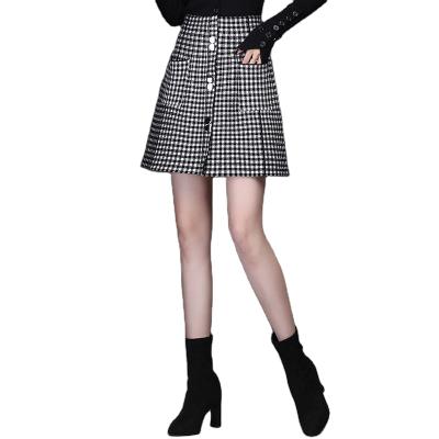 China Anti-Static Women's High Elastic Waist Jacquard Plaid A Line Knitted Mini Skirts With Pockets And Buttons for sale