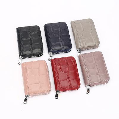 China Hot Selling RFID Card Case Women Short Leather Ladies Wallet Real Multi-bit RFID Anti-theft Card Holder for sale