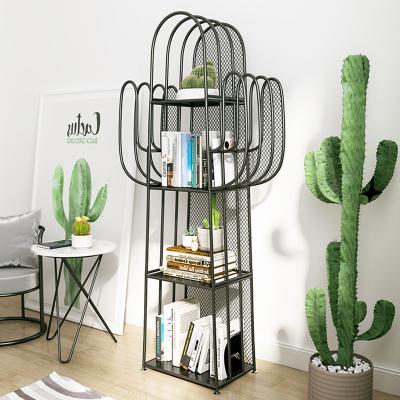 China Standing Shelves New Metal Cactus Floor Frame Display Rack Shelf Tall Bookcase With Knock Down Design for sale