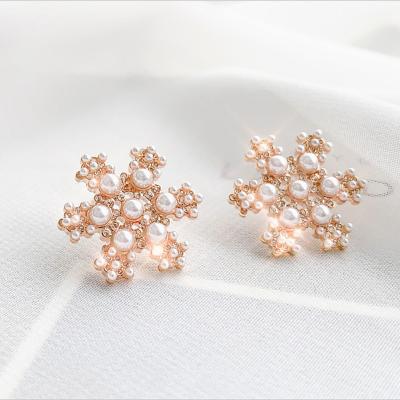 China Cheap 18k Rose Gold Plated Cubic Zirconia Snowflake Flower Stud Earrings Korean High Quality TRENDY Stud Earrings Wholesale for sale