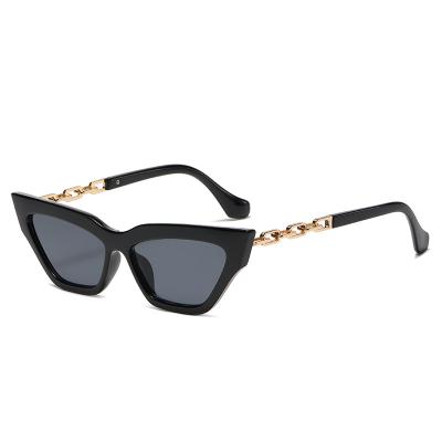 China Newest fashion sunglasses cateye female colorful plastic frame unique shades glass with chain design ins women fashionable sunglasses uv400 for sale