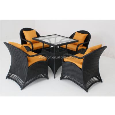 China Modern Curved Armrest Designed Garden Rattan Table And Chair Furniture Outdoor Rattan Dining for sale