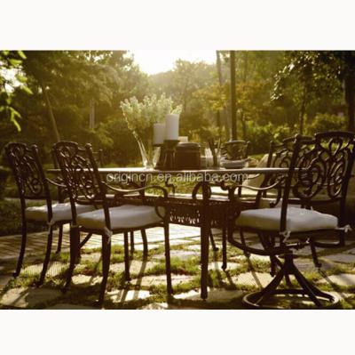 China Retro Style Butterfly Pattern Modern Outdoor Dining Table And Chair Set Of Cast Aluminum Garden Furniture for sale