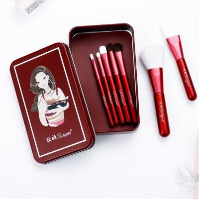 China Angular Blush XINYAN Yiwu High Quality Wooden Handle Latest Hair Professional Makeup Brush Set With Iron Box for sale