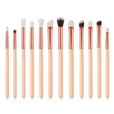 China Makes Apply Makeup XINYAN Pink Wood Handle Eyeshadow Makeup Brush For Eyes Makeup 12pcs kits brochas ojos for women for sale