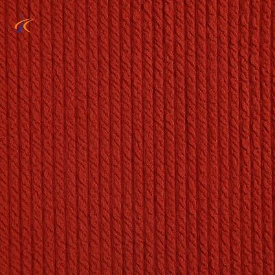 China New anti-static well-lined knit jacquard polyester blended yarn-dyed wool knitwear dress fabric for sale